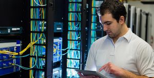 IT technician working with OnX Canada OnX Brocade Appliance